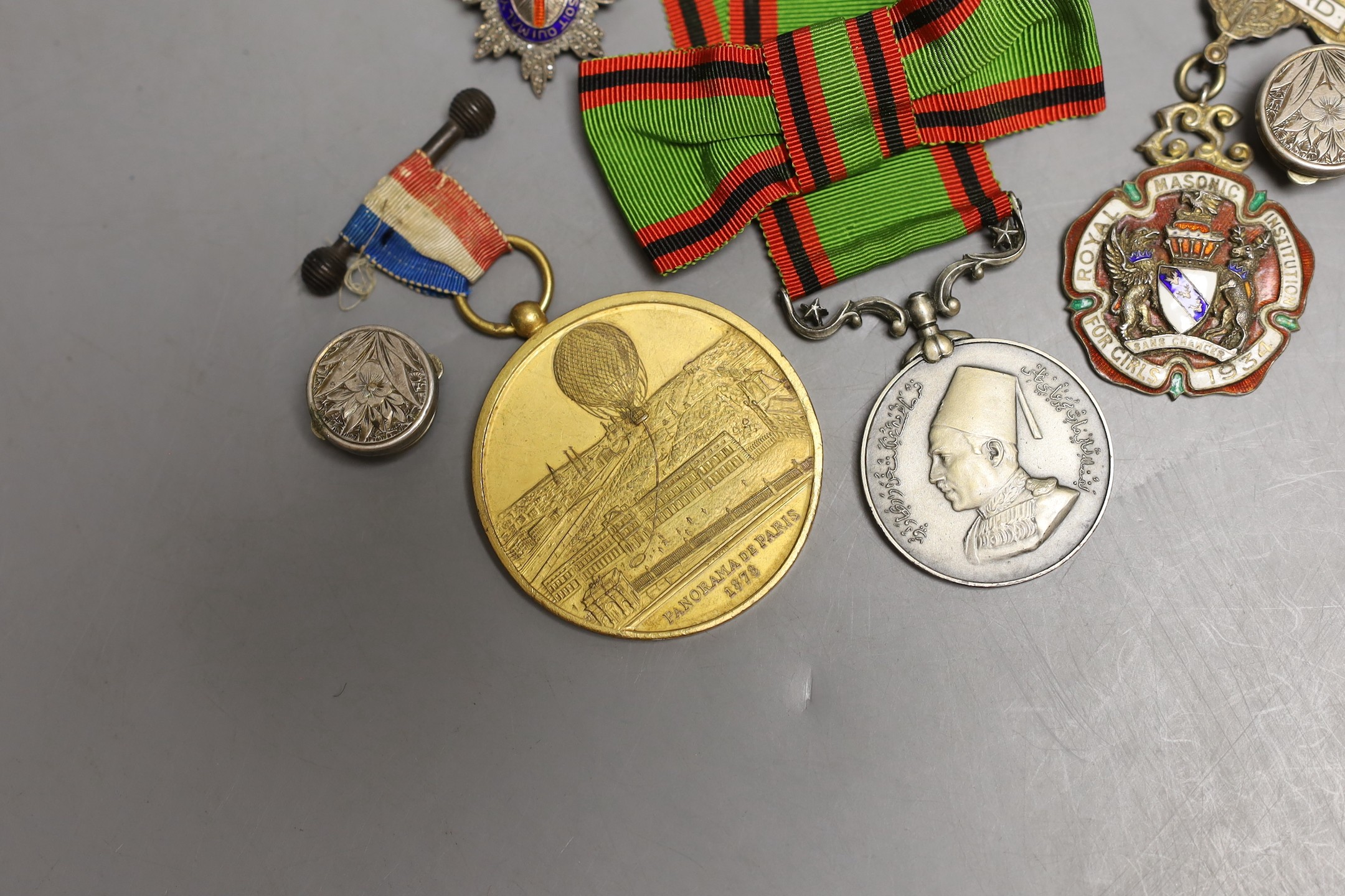 Five military badges and medals and buttons